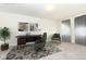 Home office with modern desk, comfortable chair, and a stylish area rug for a productive workspace at 936 Plunkett Ave, Westfield, IN 46074