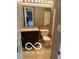 Bathroom with a modern toilet and vanity with countertop at 9808 Worthington Blvd, Fishers, IN 46038