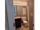 Bathroom with a vanity, granite countertop, and a tub and shower with neutral colors at 9808 Worthington Blvd, Fishers, IN 46038