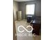 Bedroom featuring a window and carpeting at 9808 Worthington Blvd, Fishers, IN 46038
