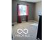 Bedroom featuring a window and carpeting at 9808 Worthington Blvd, Fishers, IN 46038