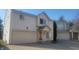 Traditional home with neutral siding, attached garage, and well-maintained front yard at 9808 Worthington Blvd, Fishers, IN 46038