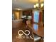 Charming eat-in kitchen with wood cabinets, modern appliances, and a breakfast bar at 9808 Worthington Blvd, Fishers, IN 46038