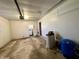 The large garage has room for storage, laundry and leads to the backyard at 1031 Schleicher Ave, Indianapolis, IN 46229