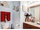 Bathroom with framed mirror, vanity, and decor that creates a relaxing ambiance at 10535 Pokagon Way, Indianapolis, IN 46239