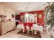 Elegant dining room featuring a set table, decorative cabinet, and a bright chandelier at 10535 Pokagon Way, Indianapolis, IN 46239