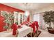 Elegant dining room with a beautifully set table, decorative china cabinet, and bright chandelier at 10535 Pokagon Way, Indianapolis, IN 46239