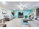 Bright living room with plush seating, modern decor, fireplace, and a large television for entertainment at 10535 Pokagon Way, Indianapolis, IN 46239