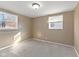 Bright bedroom with neutral carpet and plenty of natural light at 1131 Madeira St, Indianapolis, IN 46203