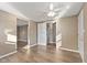 Bedroom with neutral walls, ceiling fan, wood-look flooring and closet at 1131 Madeira St, Indianapolis, IN 46203
