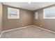 Cozy bedroom with neutral carpet, natural light, and comfortable design at 1131 Madeira St, Indianapolis, IN 46203