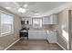 Charming kitchen with white cabinets, stainless steel appliances, and wood-look flooring at 1131 Madeira St, Indianapolis, IN 46203