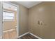 Picture of the laundry area, featuring hookups and vinyl flooring at 1131 Madeira St, Indianapolis, IN 46203
