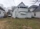 Rear exterior of the house, including a small balcony at 1311 N Olney St, Indianapolis, IN 46201