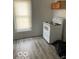 Kitchen corner featuring an electric range and a large window at 1311 N Olney St, Indianapolis, IN 46201