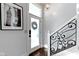 Bright entryway featuring stylish staircase, frosted glass door creates an inviting space at 1471 N Delaware St, Indianapolis, IN 46202