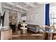 Inviting living room with coffered ceilings, hardwood floors, and bright natural light at 1471 N Delaware St, Indianapolis, IN 46202