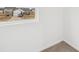 Bright bedroom featuring carpeted floors, an exterior view from the window, and white walls at 1585 N Regatta Dr, Greenfield, IN 46140