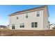 This home features a neutral siding, plenty of windows, and a glass sliding door to the backyard at 1585 N Regatta Dr, Greenfield, IN 46140