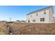 This home features a neutral siding, plenty of windows, and a glass sliding door to the backyard at 1585 N Regatta Dr, Greenfield, IN 46140