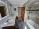 Bathroom featuring double vanity, tiled shower, and neutral paint at 16575 Audubon Ct, Noblesville, IN 46060