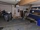 Spacious garage with ample storage space, shelving, and organization, ready for multiple vehicles at 16575 Audubon Ct, Noblesville, IN 46060