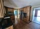 Well-equipped kitchen with stainless steel appliances, granite countertops, and wood flooring at 16575 Audubon Ct, Noblesville, IN 46060