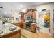 Kitchen featuring wooden cabinets, stainless steel appliances, and an island for added workspace at 1794 Bell Rd, Morgantown, IN 46160