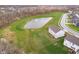 A well-maintained home is nestled in a serene neighborhood near a pond with fountain and green space at 19477 Quilling Ln, Noblesville, IN 46062