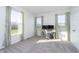 Bright bedroom with natural light, carpet floors, and a work space at 19477 Quilling Ln, Noblesville, IN 46062