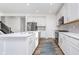 Bright kitchen featuring an island, modern appliances, and plenty of cabinet space at 19477 Quilling Ln, Noblesville, IN 46062