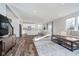 Open living space features a modern kitchen, dining area, and cozy living room for seamless entertaining at 19477 Quilling Ln, Noblesville, IN 46062