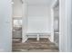 Bright mud room with built-in storage, bench seating, and easy access to other areas of the house at 19477 Quilling Ln, Noblesville, IN 46062