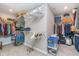 Spacious walk-in closet featuring shelving and hanging rods for maximum storage and organization at 19477 Quilling Ln, Noblesville, IN 46062