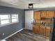 Functional kitchen showcases wooden cabinets and countertops, offering a traditional aesthetic with practical design at 2105 N Cherry St, Columbus, IN 47201
