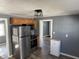 Cozy kitchen featuring stainless steel appliances and ample cabinet space for convenient storage solutions at 2105 N Cherry St, Columbus, IN 47201