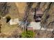 Birds-eye view of the home, outbuildings, garden, and surrounding property with mature trees at 2305 Bill Smith Rd, Martinsville, IN 46151