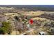An aerial view of the property and surrounding landscape with a red pin indicating the property location at 2305 Bill Smith Rd, Martinsville, IN 46151