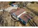 Aerial view of the house, including its porch, and garden area with raised planting beds at 2305 Bill Smith Rd, Martinsville, IN 46151