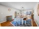 Charming dining area with views of the patio and open access to the modern kitchen at 2305 Bill Smith Rd, Martinsville, IN 46151