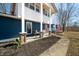 Inviting front porch area with comfortable seating, decorative pillars and a freshly landscaped garden bed at 2305 Bill Smith Rd, Martinsville, IN 46151