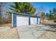Spacious detached two-car garage with ample parking space on a concrete pad at 2305 Bill Smith Rd, Martinsville, IN 46151
