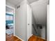 View from hallway into bedroom with patterned rug and doorway leading to stairs at 2305 Bill Smith Rd, Martinsville, IN 46151