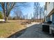Relaxing outdoor patio area with comfortable seating and view of the well-maintained lawn and landscape at 2305 Bill Smith Rd, Martinsville, IN 46151