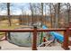 Backyard showcasing a pond view, above ground pool, and a lush landscape at 2387 Bill Smith Rd, Martinsville, IN 46151