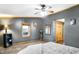 Comfortable bedroom featuring a ceiling fan, plush carpeting, and light gray walls at 2387 Bill Smith Rd, Martinsville, IN 46151
