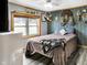 Comfortable bedroom with a window, neutral walls, and simple furnishings at 2387 Bill Smith Rd, Martinsville, IN 46151