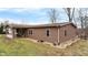 Exterior view of home with durable siding, complemented by a well-manicured lawn and rock landscaping at 2387 Bill Smith Rd, Martinsville, IN 46151