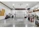 View of the garage featuring a concrete floor, high ceilings, and large garage doors at 2387 Bill Smith Rd, Martinsville, IN 46151