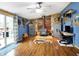 Rustic living room featuring a wood-burning stove, decor, and plenty of natural light at 2387 Bill Smith Rd, Martinsville, IN 46151